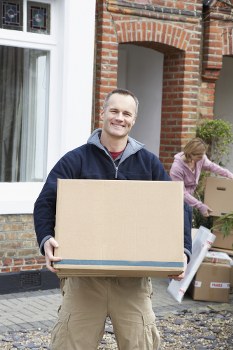 Removal van and moving team prepared for a house move in Bigginhill