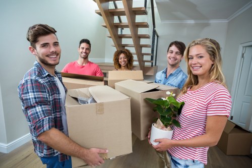 Moving van being loaded with household items