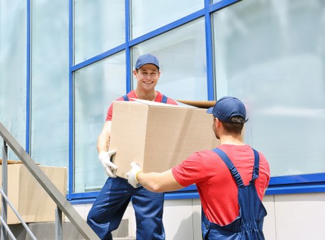 Boxes and furniture being loaded carefully for a move in Bigginhill