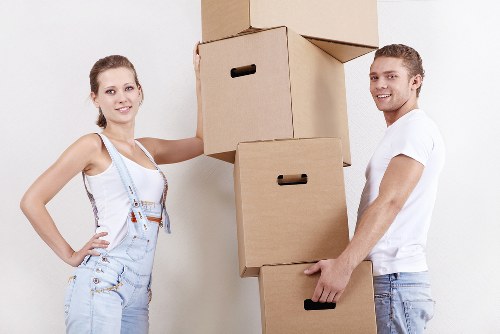 Moving team loading boxes for a property relocation in Bigginhill