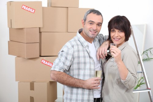 Local van removal team handling boxes and furniture for a Bigginhill move